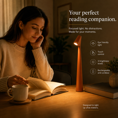 Young woman reading with the orange LumiNord reading lamp, eye friendly light and touch control