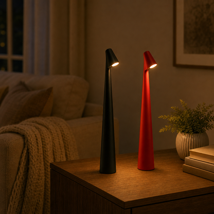 Two LumiNord cordless LED table lamps in black and red on a sideboard in the living room