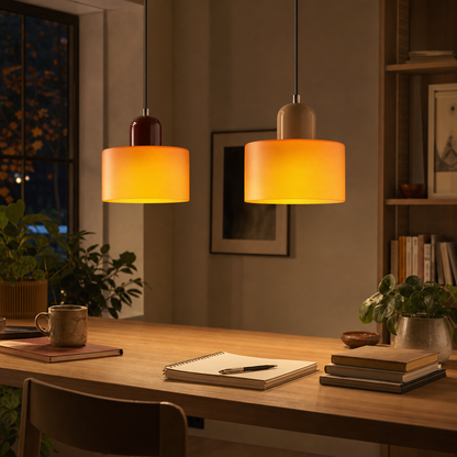 Two Colora glass pendant lights above a desk in the home office